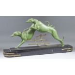 IRENEE ROSHARD (1906-1984) - Painted spelter group - "Course de Levriers" (greyhound racing), on