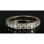 A Diamond Full Hoop Eternity Ring, Modern, in silvery coloured metal mount, set with twenty-five