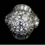 A Diamond Cluster Ring, Modern, by Boucheron of France, in 18ct white gold mount, set with brilliant