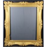 A 19th Century Continental Gilt Moulded Swept Frame, 53.5ins x 45.5ins overall (to take canvas 42ins