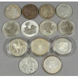 Four American Silver Dollars 1889, 1890, 1921 and 1922, four Elizabeth II silver Britannias 1998,