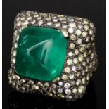 An Emerald and Diamond Ring, Modern, by Hedy Martinelli, in titanium mount, set with a central