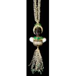 A Carved Wood, Gold, Emerald, Diamond and Pearl "Blackamoor" Pendant, set with emeralds, approximate