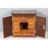 A 19th Century Mahogany Table Cabinet, with moulded and dentil cornice, the cedar wood fitted