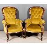 A Pair of Victorian Mahogany Framed Spoonback Easy Chairs, with moulded showwood frames, upholstered