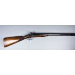 A 12 Bore Side by Side Muzzle Loading Black Powder Shotgun by Navy Arms, Modern, Serial No. 2337,