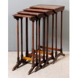 A Nest of Four Mahogany Rectangular Occasional Tables of "George III" Design, on slender twin turned