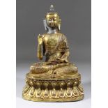 An Indo Chinese Gilt Bronze Figure of a Seated Buddha, 20th Century, on triangular base, 11ins (