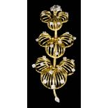 An 18ct Gold and Diamond Brooch, 20th Century, by Cartier, of floral design with open wirework and