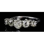 A Five Stone Diamond Ring, Modern, in platinum mount, set with round brilliant cut diamonds of