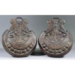 A Pair of Carved and Stained Hardwood Stirrups, 8ins high