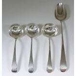 A George III Silver Old English Pattern Gravy Spoon, a Pair of George III Silver Sauce Ladles, and