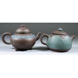 A Chinese Yixing Stoneware Teapot and Lid, the body with applied cloud motifs highlighted in blue,