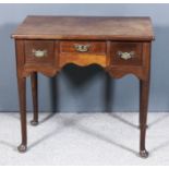 A George II "Cuban" Mahogany Lowboy, with moulded edge to top fitted three small drawers above