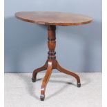 A 19th Century Mahogany Oval Tripod Table, on turned central column and splayed legs with block