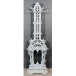 A Grey Painted Cast Iron Hall Stand in the Coalbrookdale Manner, Victorian, the tall openwork back