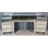 A Modern Mirrored Rectangular Dressing Table, fitted four drawers, with square mirrored legs,