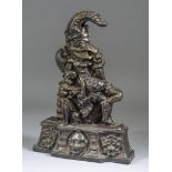 A Mr Punch Cast Iron Doorstop, 20th Century, Punch depicted in profile while his dog looks out, 13.