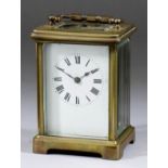 An Early 20th Century French Carriage Timepiece, the white enamel dial with Roman numerals, to the