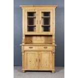 A 19th Century Eastern European Stripped Pine Buffet, the upper part with moulded cornice, fitted