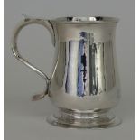 A George II Silver Baluster Shaped Tankard, by John Langland I, Newcastle 1757, with moulded rim and