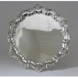 An Edward VII Silver Circular Salver, by James Aitchison, London 1906, the moulded piecrust rim with