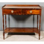 A 19th Century Mahogany Tray Top Two-Tier Side Table, fitted two frieze drawers, on slender turned