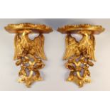 A Pair of Modern Gilt Wood Wall Brackets of 18th Century Design and a Pair of White Plaster Wall