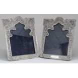 A Pair of Continental Silvery Metal Rectangular Photograph Frames of Arabic Design, boldly