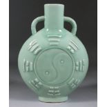 A Chinese Green Celadon Glazed Stoneware Two-Handled "Pilgrim's Flask", 20th Century, the circular