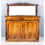 A William IV Rosewood Chiffonier, the upper part with tray top shelf with fretted and carved back,