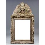 An Italian Silvered Wood Rectangular Dressing Table Mirror, 19th Century, the shaped cresting carved