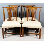 A Set of Four Mahogany Dining Chairs of "Country Chippendale" Design, the crest rails with scroll