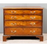 A George III Mahogany Chest, with moulded edge to top, fitted four long graduated drawers, on