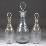 An English Mallet Shaped Decanter with Panel Cutting, Early 19th Century, 12.5ins high overall, a