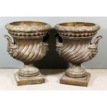 A Pair of Imposing Green/Brown Patinated Bronze Two-Handled Urns in the French Manner, the rim