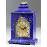 A 20th Century Mantel Timepiece in Blue Lapis Lazuli Case of "18th Century" Design, the arched brass