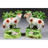 A Pair of English Pearlware Pottery Models of Standing Ewe and Ram, Early 19th Century, each