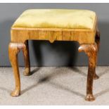 An Early 18th Century Walnut Rectangular Stool, the drop-in seat with old gold velour, with
