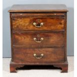 A George III Mahogany Chest of Small Proportions, with moulded edge to top, fitted with a brushing