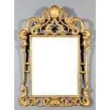 A Modern Gilt Framed Rectangular Wall Mirror, of Italian design, with pierced and carved shell and