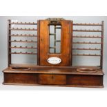 A Mahogany Cox's Cash Till, by J. C. Cox, Late 19th Century, with glass backed racks to side, two