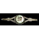 A British Nazi Party Brooch, in "Sterling" silver mount, with circular mother-of-pearl centre