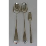 Two George III Silver Old English pattern Gravy Spoons and a Silver Double-Ended Marrow Scoop, one