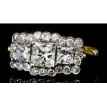 A Diamond Cluster Ring, Modern, in 18ct gold mount, the rectangular face set with three square