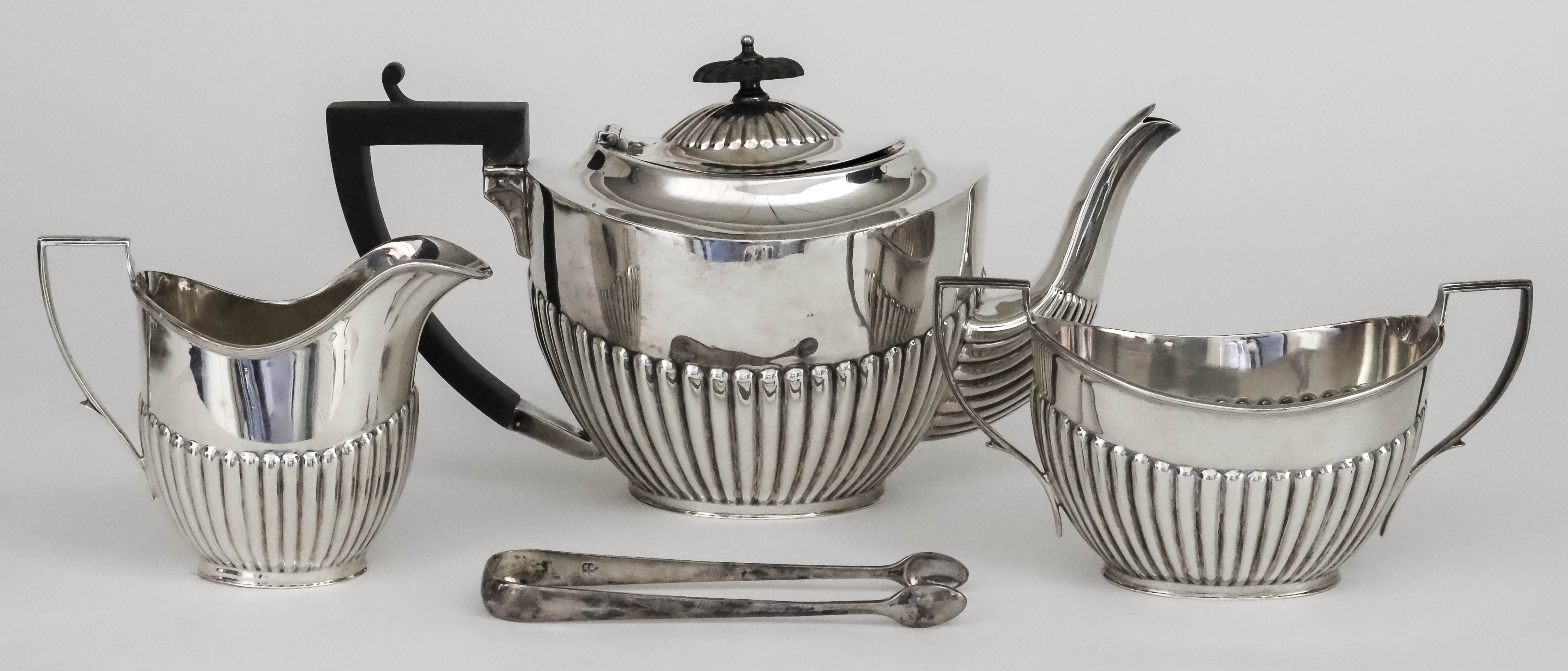 A George V Silver Three Piece Tea Service, by Kooper Brothers & Sons Ltd, Sheffield 1925 and 1926,