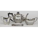 A George V Silver Three Piece Tea Service, by Kooper Brothers & Sons Ltd, Sheffield 1925 and 1926,