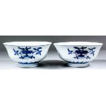 A Pair of Chinese Porcelain Underglaze Blue and Copper Red "Peach" Bowls, 7.75ins (19.5cm)