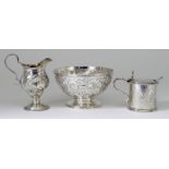 A George III Silver Circular Sugar Bowl, probably London 1789, the body boldly embossed and chased