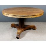 A Victorian Mahogany Circular Breakfast Table, with square edge to top, on turned and tapered